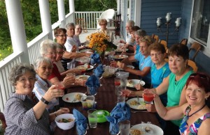 Group meal on the front porch of the Lumber Baron's House with a great view of Lake Temiskaming