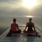 Morning meditation on dock at the Presidents' Suites and enjoying the sunrise on lake Temiskaming. / Méditation du matin sur le quai aux Suites des Présidents en profitant du levée de soleil sur le lac Témiskaming.