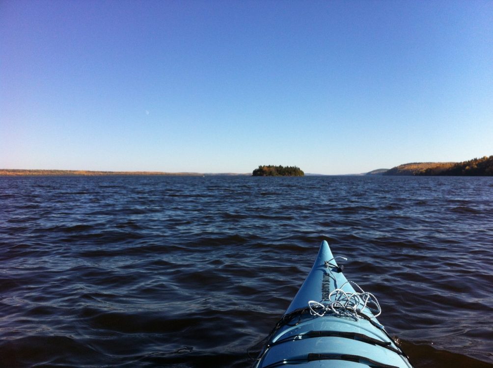 Kayaking to Farr Island on Lake Temiskaming.Our guests can use both our kayaks or canoes. / En route vers l'île Farr sur le lac Témiskaming. Nos clients peuvent utiliser nos kayaks ou canots.